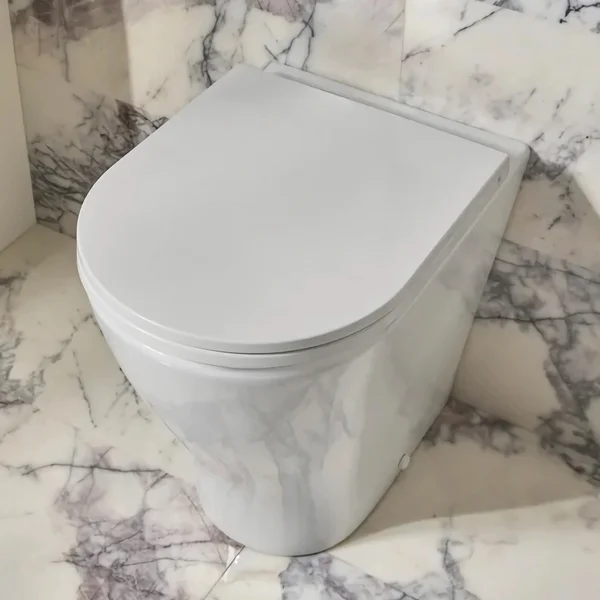 Additional image of Tavistock Cadence Round Rimless Back To Wall White WC Pan - 340 x 490mm